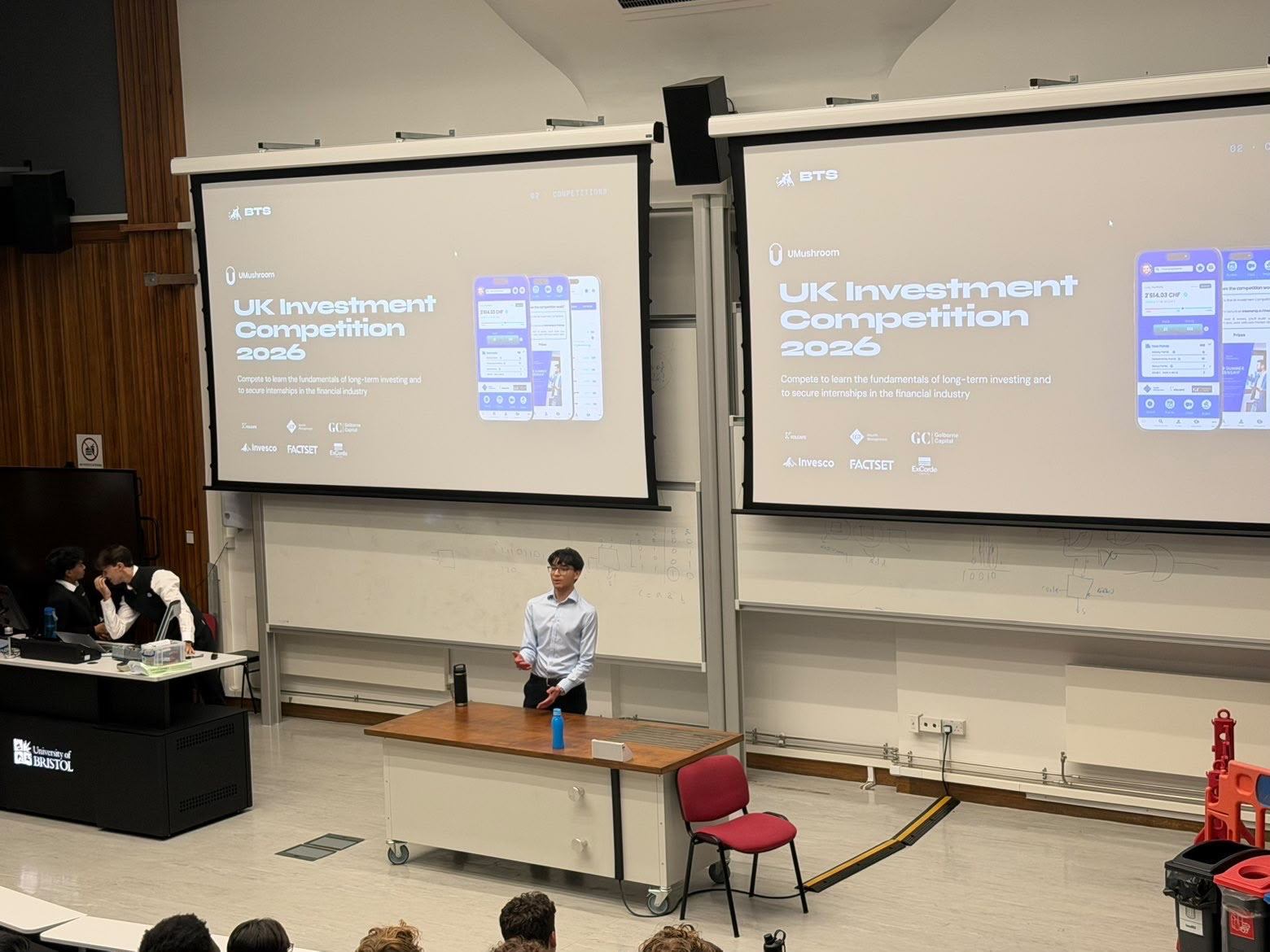 The UK Investment Competition 2026 presented on the lecture theatre screens at the Welcome Event