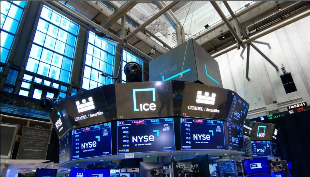 The trading floor of the New York Stock Exchange, owned by ICE, with ICE and NYSE displays